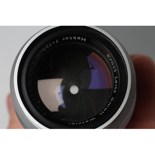 545 - A CARL ZEISS PLANAR LENS, 2/50 ZM, T*, 15868368, boxed, together with an Ernst Leitz GmbH Wetzlar le... 