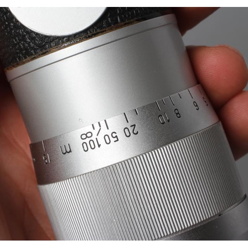 545 - A CARL ZEISS PLANAR LENS, 2/50 ZM, T*, 15868368, boxed, together with an Ernst Leitz GmbH Wetzlar le... 