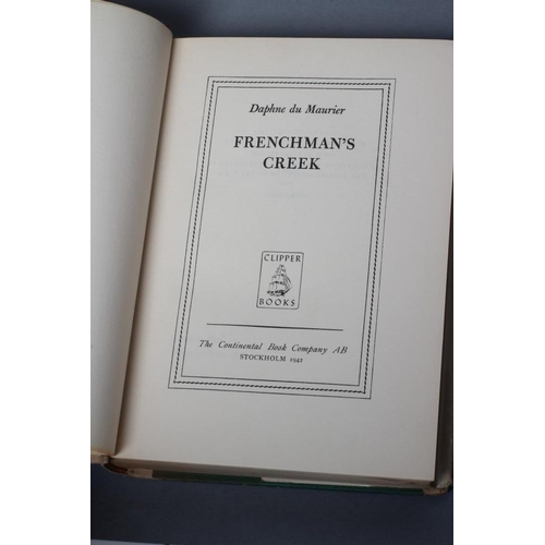 556 - A SIGNED COPY OF FRENCHMAN'S CREEK by Daphne du Maurier, The Continental Book Company 1942 signed in... 