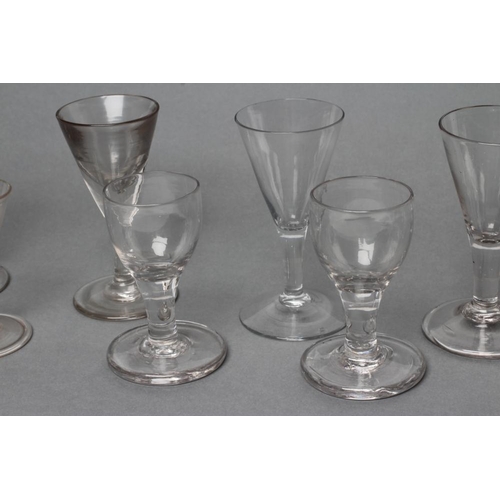 59 - A COLLECTION OF TEN DRAM AND OTHER GLASSES, late 18th century and later, several with a folded foot,... 