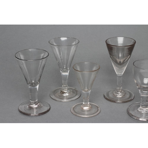 59 - A COLLECTION OF TEN DRAM AND OTHER GLASSES, late 18th century and later, several with a folded foot,... 