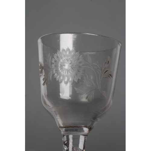 61 - A CORDIAL GLASS, mid 18th century, the ogee bowl engraved with a flower and butterfly, raised upon a... 