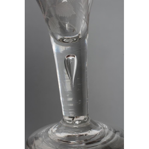 68 - A JACOBITE WINE GLASS, mid 18th century, the trumpet bowl engraved with a rose and thistle on a plai... 