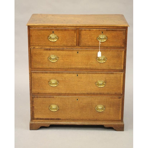 774 - AN OAK AND MAHOGANY BANDED CHEST, early 19th century, the moulded edged top over two short and three... 