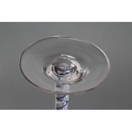 86 - A WINE GLASS, mid 18th century, the bell bowl on a single blue twist enclosing a multi-ply air corks... 