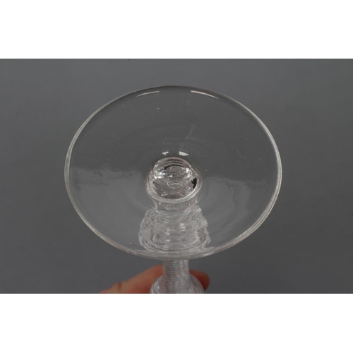 88 - A CORDIAL GLASS, mid 18th century, the round funnel bowl on shoulder knop and multi-spiral air twist... 