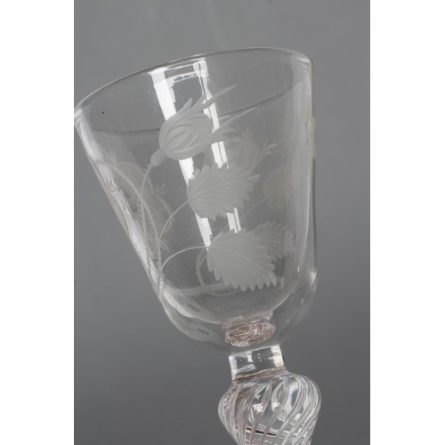 93 - A JACOBITE WINE GLASS, mid 18th century, the round funnel bowl engraved with a rose and star, on sho... 