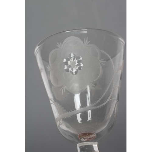 93 - A JACOBITE WINE GLASS, mid 18th century, the round funnel bowl engraved with a rose and star, on sho... 