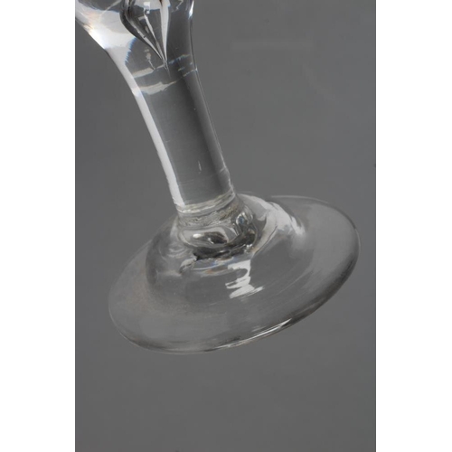 96 - A WINE GLASS, mid 18th century, the conical bowl on inverted balustroid stem with tear drop, on high... 