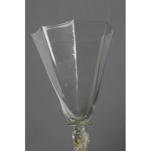 97 - A FACON DE VENISE WINE GLASS, mid 17th century, the flared octagonal bowl on blade knopped shoulder ... 