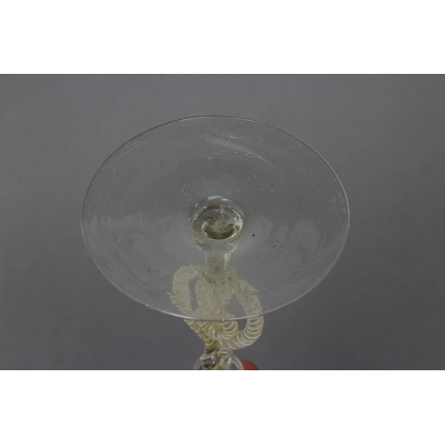 97 - A FACON DE VENISE WINE GLASS, mid 17th century, the flared octagonal bowl on blade knopped shoulder ... 