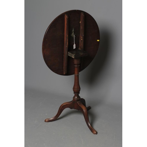 773 - A GEORGIAN MAHOGANY TRIPOD TABLE, late 18th century, the circular tip-up top on ring turned vase ste... 