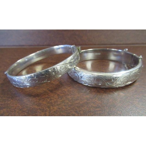 290 - TWO SILVER BANGLES