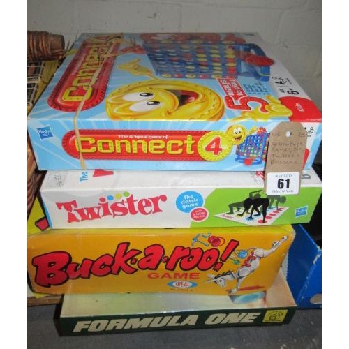 61 - FOUR VINTAGE GAMES INCLUDING TWISTER AND BUCKAROO