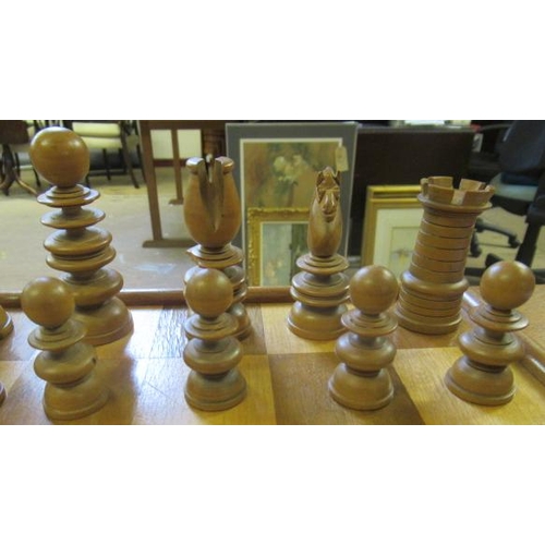 507 - A TURNED WOOD CHESS SET in box and hardwood, kings 3 3/4