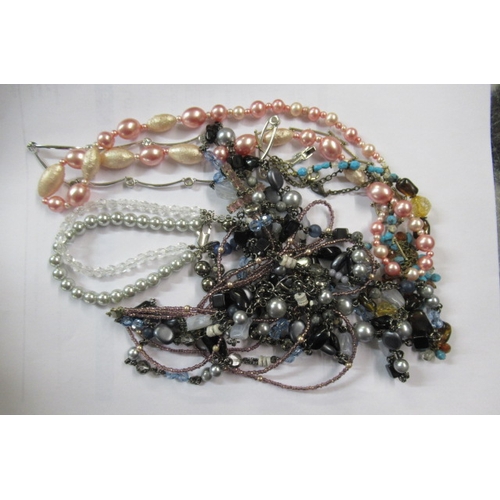 231 - BOX OF COSTUME JEWELLERY