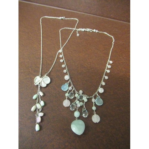 211 - TWO SILVER NECKLACES