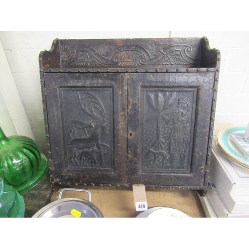 479 - CARVED LEATHER COVERED CABINET