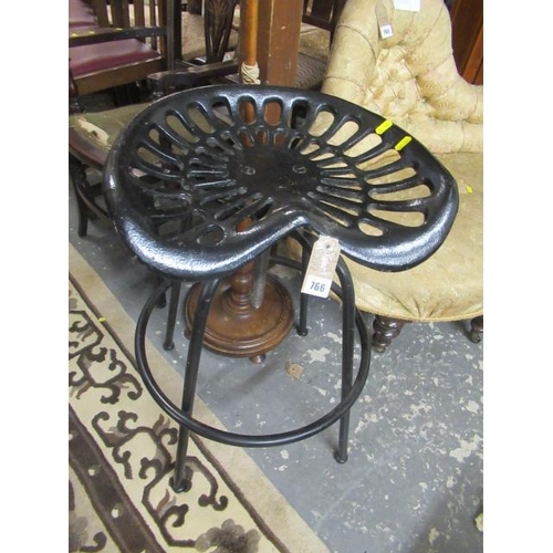 766 - BLACK IRON TRACTOR SEAT STOOL