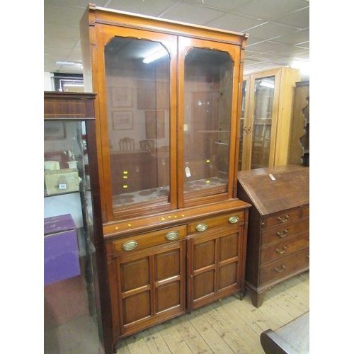 951 - GLAZED BOOKCASE ON CUPBOARD