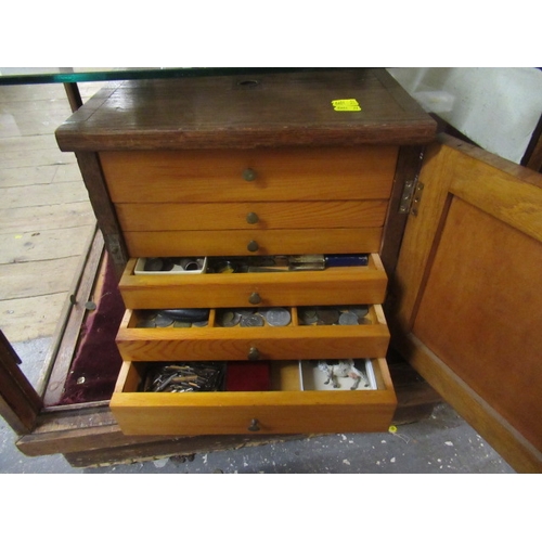 229A. - OAK COLLECTORS CABINET AND CONTENTS INCLUDING POCKET WATCHES SILVER SPOONS AND COLLECTABLE PENS ETC