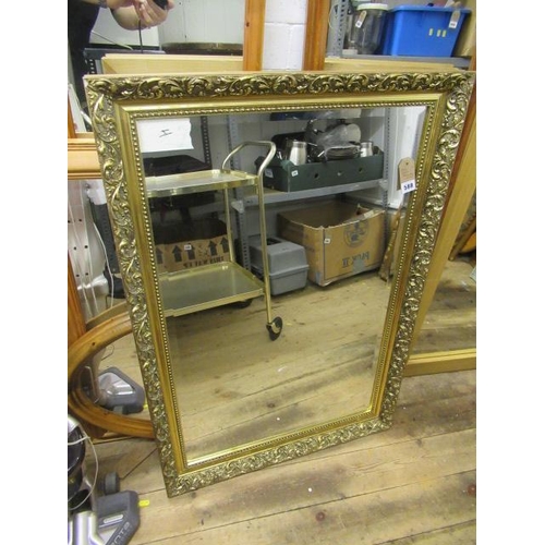 588 - GILT FRAMED MIRROR