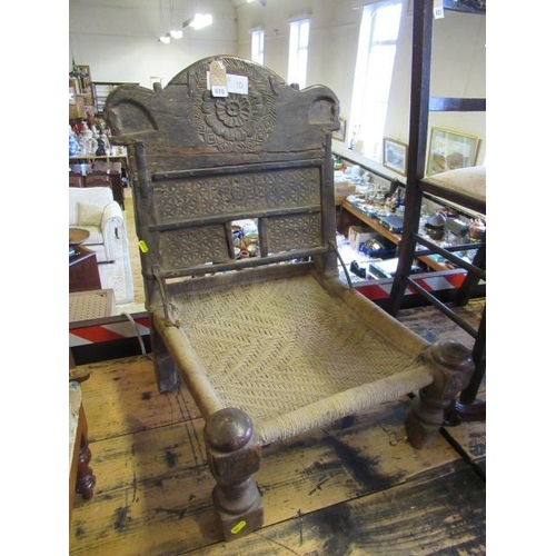 620 - LOW CARVED INDIAN CHAIR