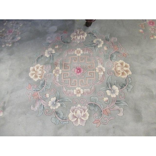 689 - LARGE PALE GREEN CHINESE CARPET