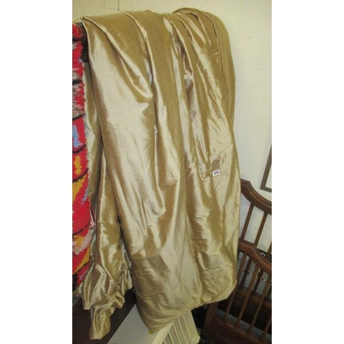 878 - PAIR OF LINED AND PADDED GOLD SILK TAFFETA CURTAINS