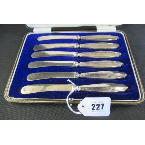 227 - CASED SET OF SIX SILVER HANDLED BUTTER KNIVES