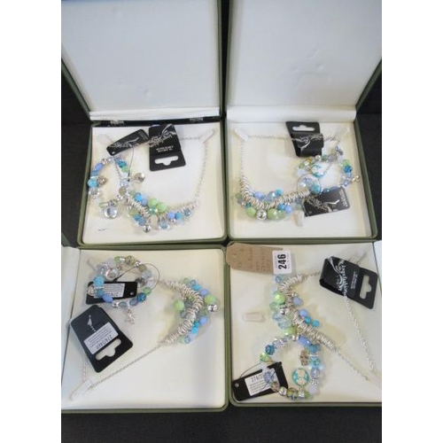 246 - FOUR BOXED NEW JEWELLERY SETS