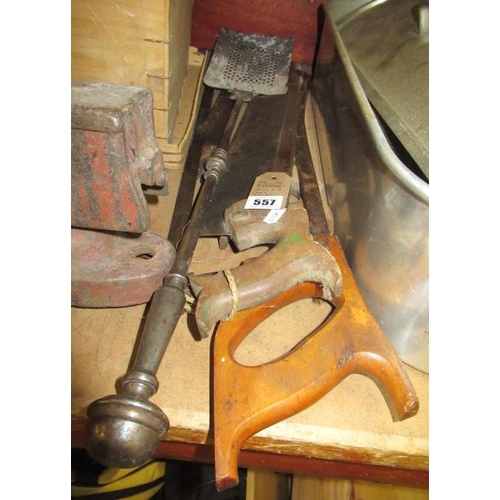 557 - THREE VINTAGE SAWS AND A COAL SHOVEL