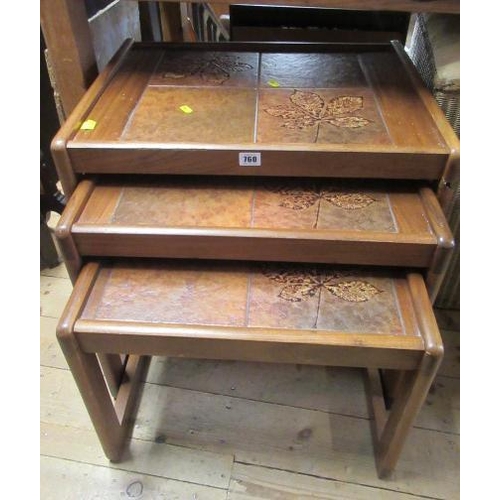 760 - NEST OF THREE TEAK TILE TOPPED TABLES