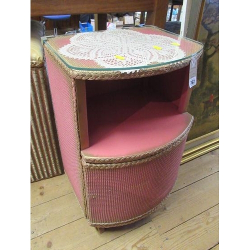 762 - PINK WOVEN CANE BEDSIDE CABINET