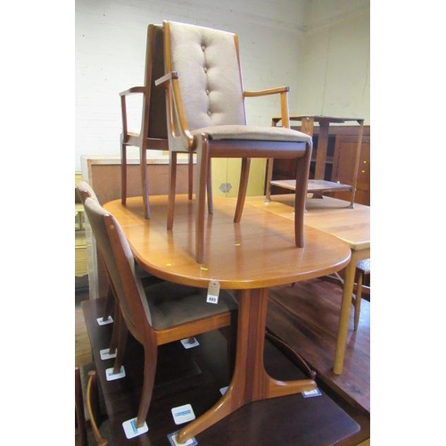 885 - RETRO TEAK EXTENDING DINING TABLE AND SIX CHAIRS