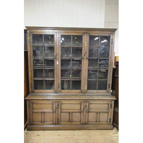 894 - OAK BOOKCASE ON CUPBOARD