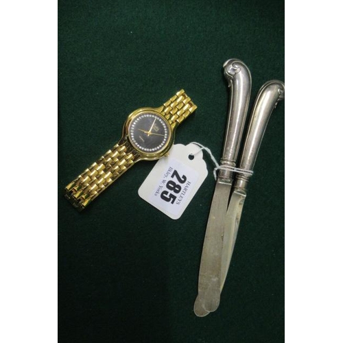 285 - ANDRE ZACH LADIES WRISTWATCH AND TWO SILVER HANDLED TEA KNIVES