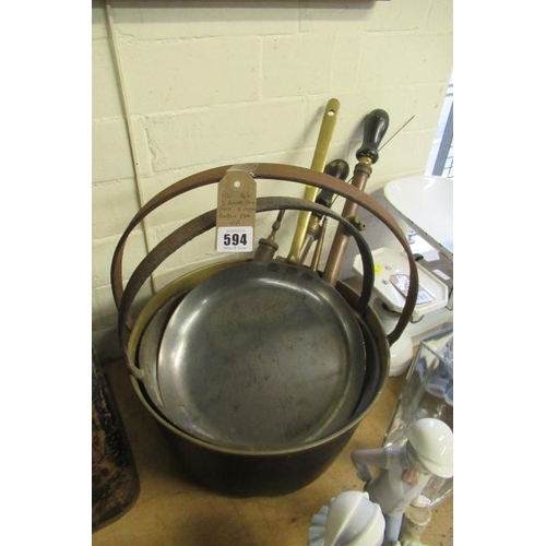 594 - TWO BRASS JAM PANS AND A COPPER BOTTOMED PAN ETC