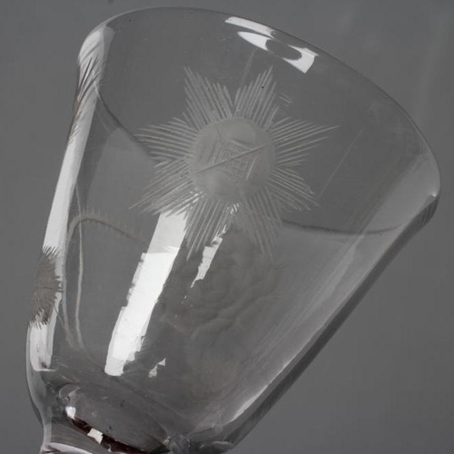 109 - A JACOBITE WINE GLASS, mid 18th century, the round funnel bowl engraved with a rose, bud and a star,... 