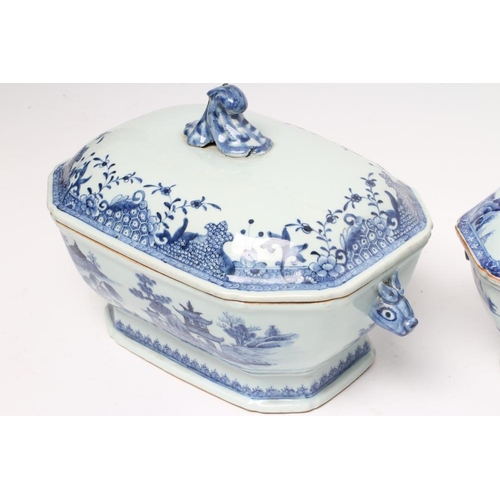 11 - TWO CHINESE EXPORT PORCELAIN TUREENS AND COVERS of canted oblong form, painted in underglaze blue wi... 