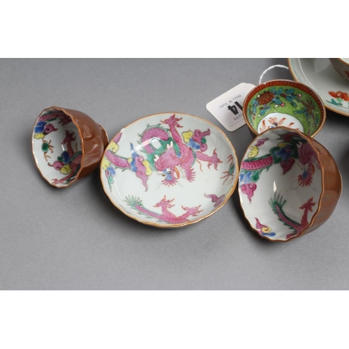 14 - A COLLECTION OF BATAVIAN FAMILLE ROSE PORCELAIN, comprising a teabowl and saucer painted with a king... 