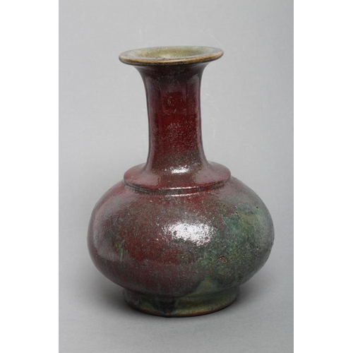 22 - A CHINESE STONEWARE VASE of double gourd form in a sang de boeuf glaze, 5 1/2