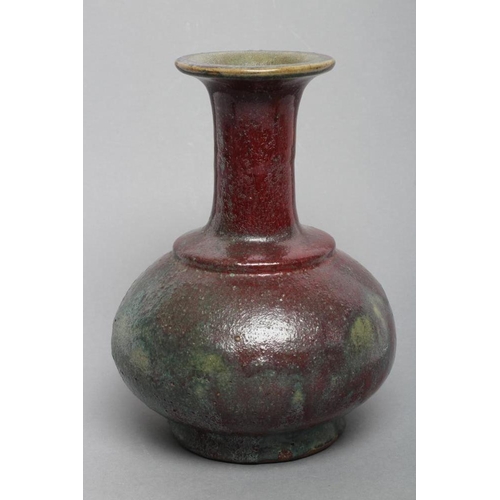 22 - A CHINESE STONEWARE VASE of double gourd form in a sang de boeuf glaze, 5 1/2