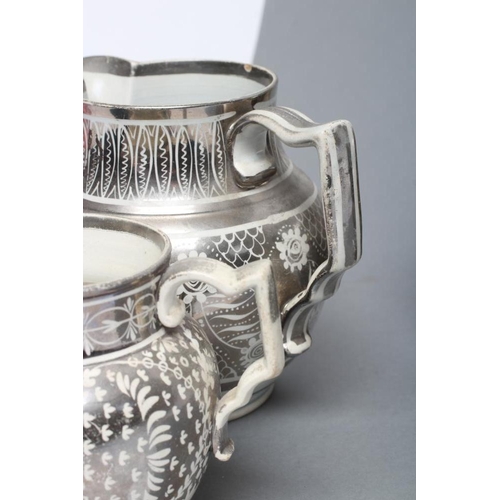 27 - A DOCUMENTARY DRABWARE JUG, 1813, of baluster form, painted in silver lustre with a heart panel insc... 