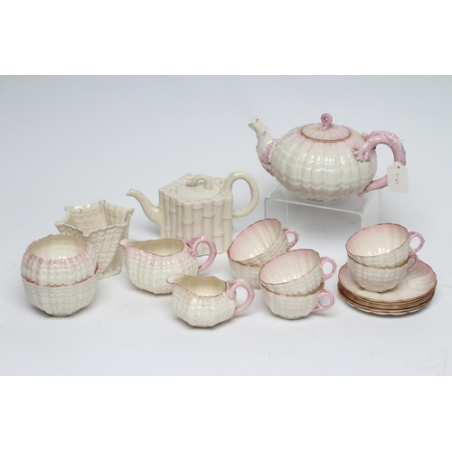 42 - A VICTORIAN FIRST PERIOD BELLEEK PORCELAIN NAUTILUS TEA SERVICE with shaded pink rims, comprising si... 