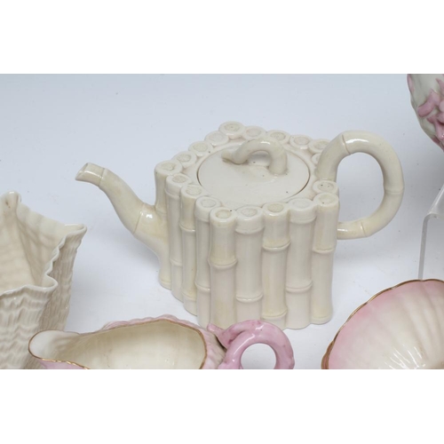 42 - A VICTORIAN FIRST PERIOD BELLEEK PORCELAIN NAUTILUS TEA SERVICE with shaded pink rims, comprising si... 