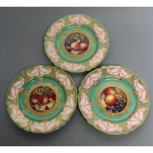 46 - A SET OF THREE ROYAL WORCESTER CABINET PLATES, 1929 and 1931, of shaped circular form, centrally pai... 