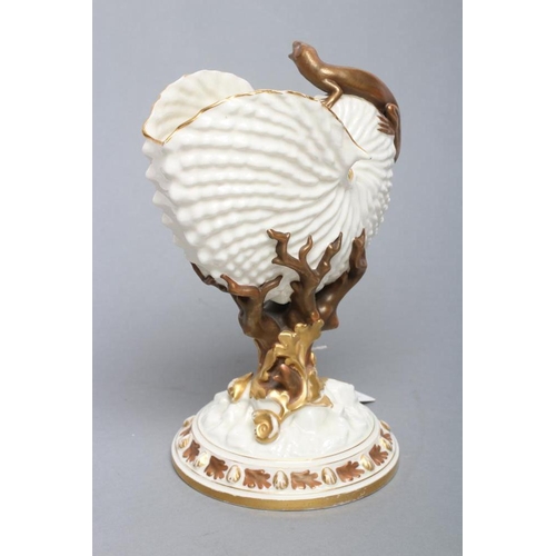 47 - A LATE VICTORIAN ROYAL WORCESTER NAUTILUS VASE surmounted by a lizard, raised upon a bronzed and gil... 