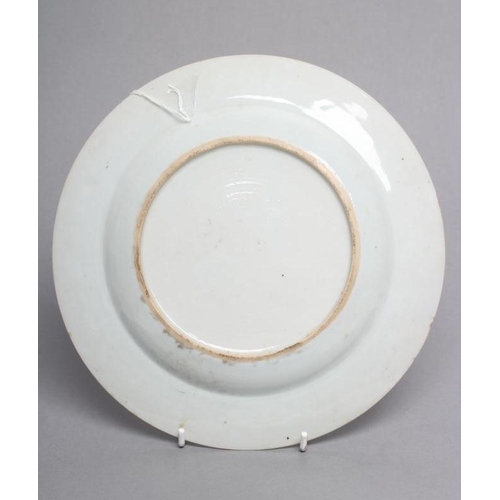 5 - A CHINESE EXPORT PORCELAIN PLATE of plain circular form, with blanc-de-chine enamelled foliate centr... 