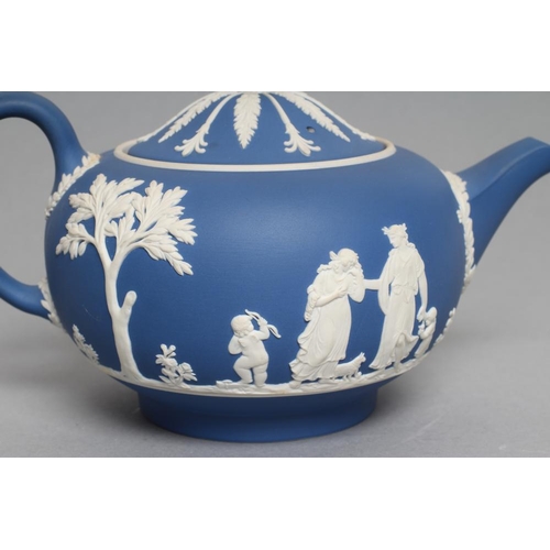 57 - A WEDGWOOD BLUE JASPER TEAPOT AND COVER, modern, with classical figure sprigging, together with a si... 